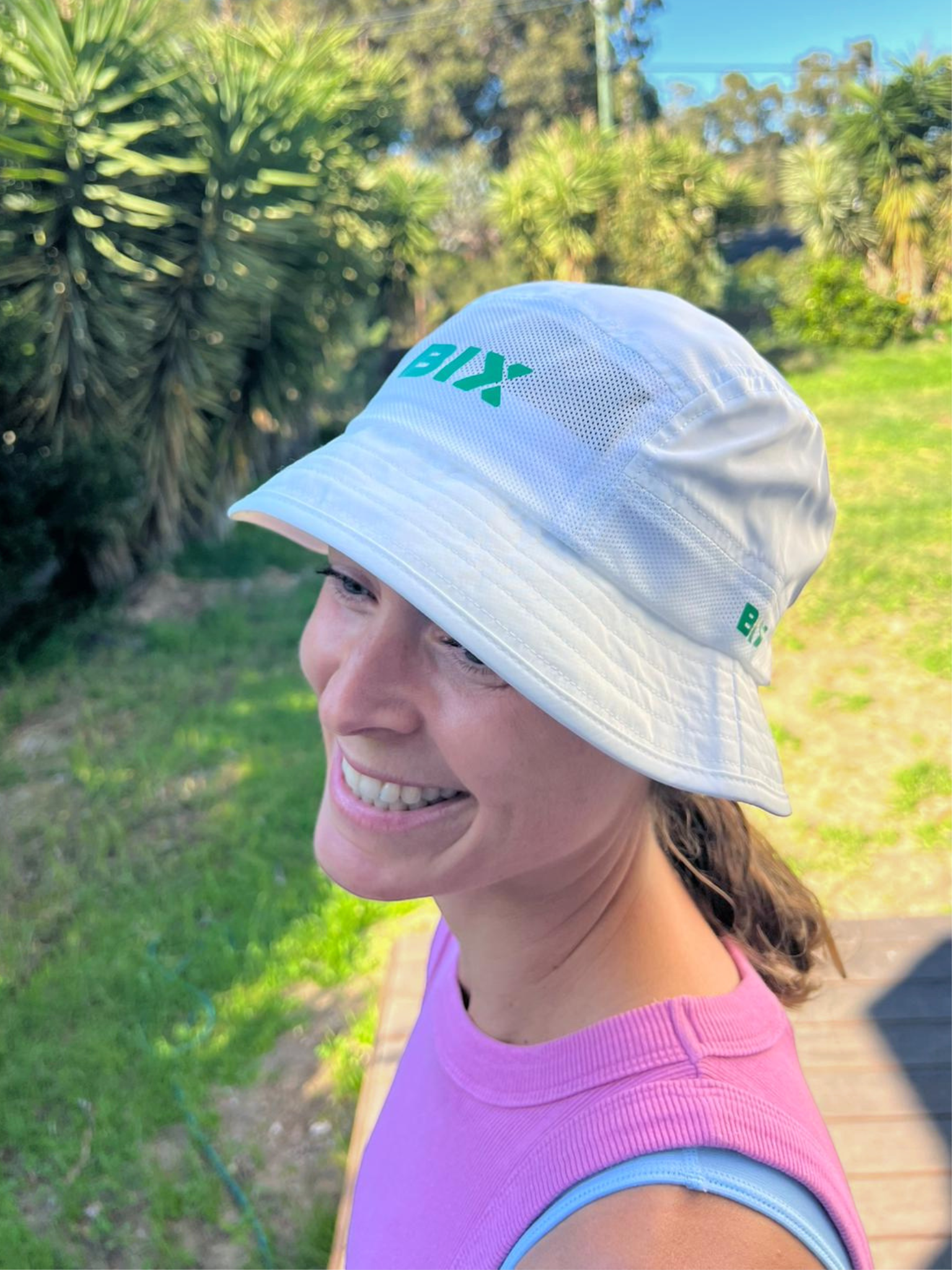 Bix Ultra Light Bucket Hat – White with Green Logo