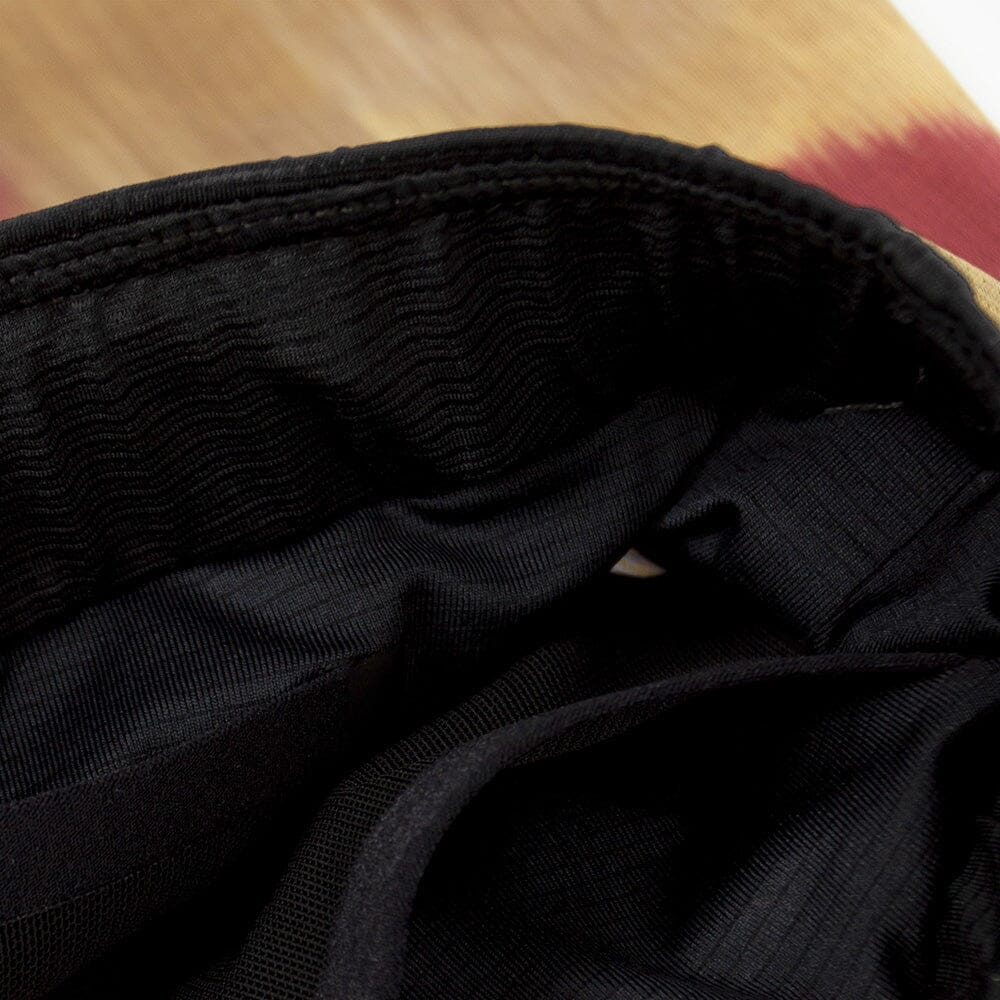 detail view of the fabric of the ciele athletics lightweight, race ready and performance driven short named RDShort in sphinx color