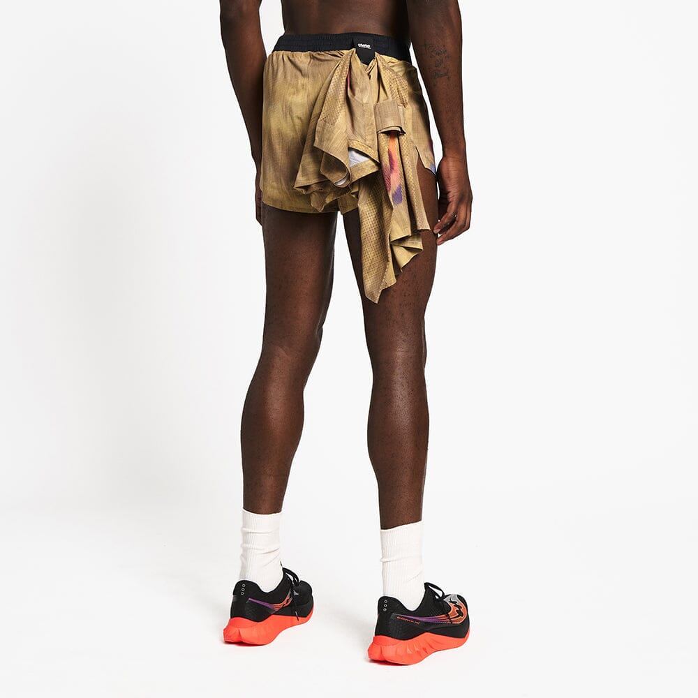 back view of the ciele athletics lightweight, race ready and performance driven short named RDShort in sphinx color, on a model 