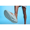 Men's OOriginal Sandal - Mist close up of bottom of shoe on model in studio with blue background