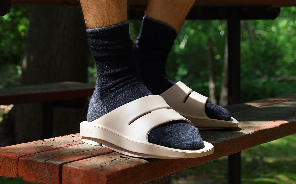 Men's OOahh Slide Sandal - Nomad close up image of model in shoes