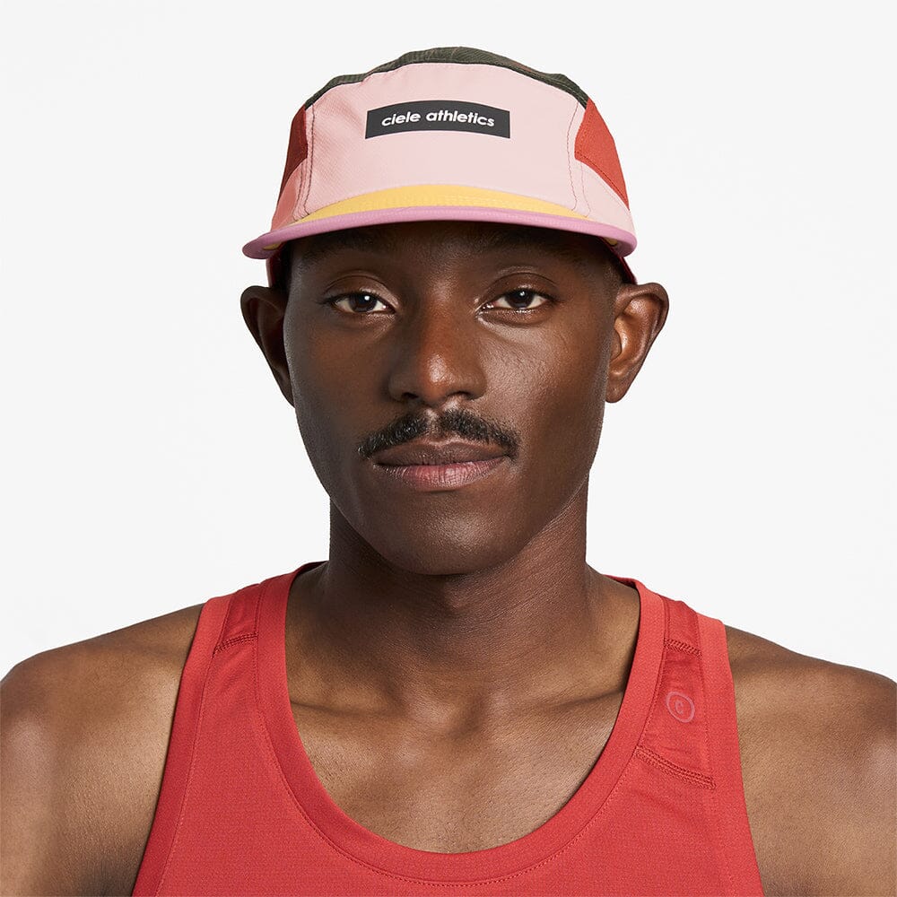 front view of ciele athletics GOCap Field Iconic Bar unisex running hat in peachskin seaweed color