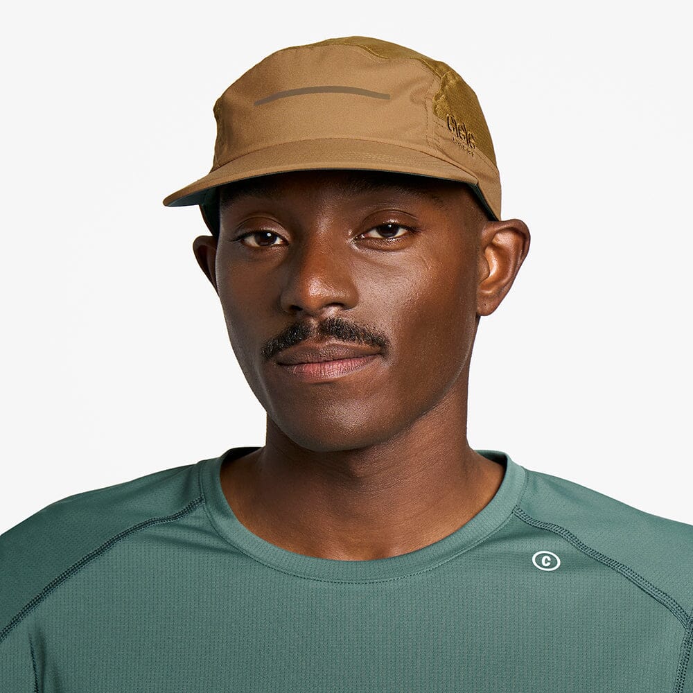 front view of ciele athletics GOCap Comp Bars unisex running hat in dark ochre color