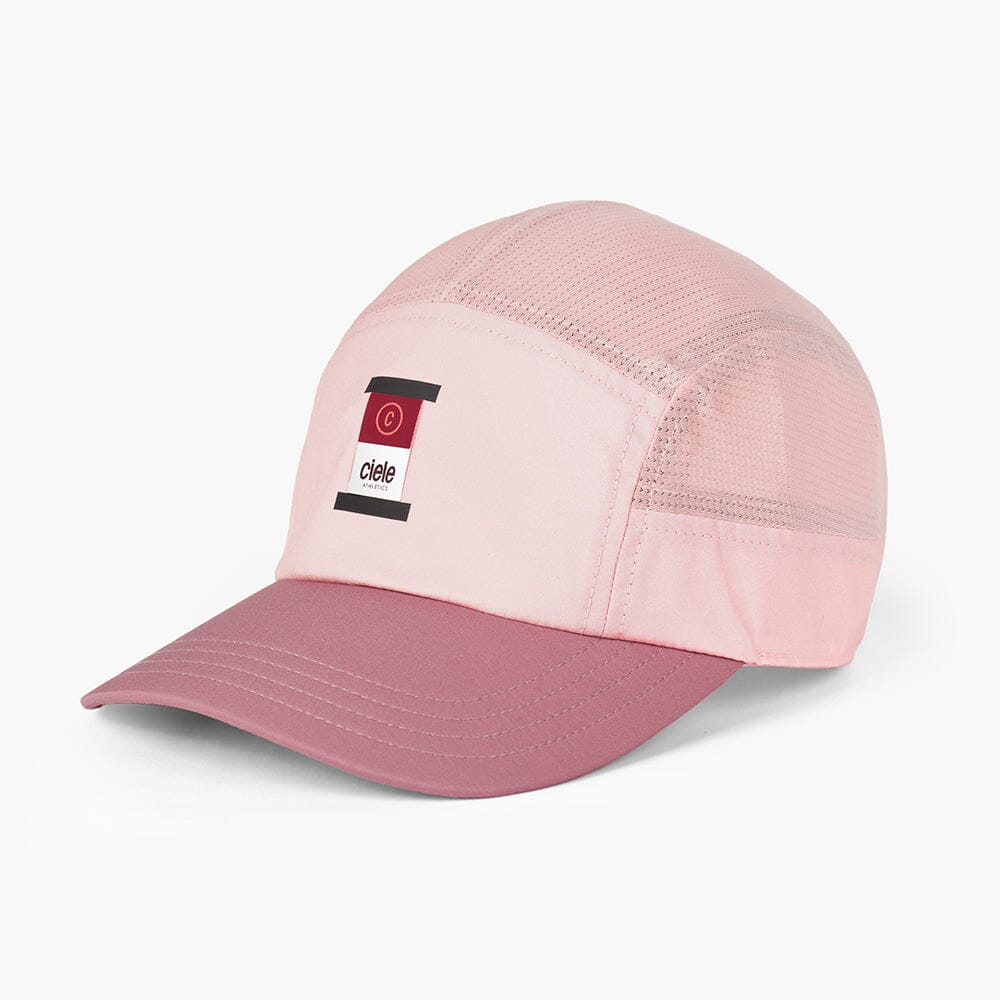 front view of the ciele athletics GOCap with a curved brim unisex running hat in peachskin color