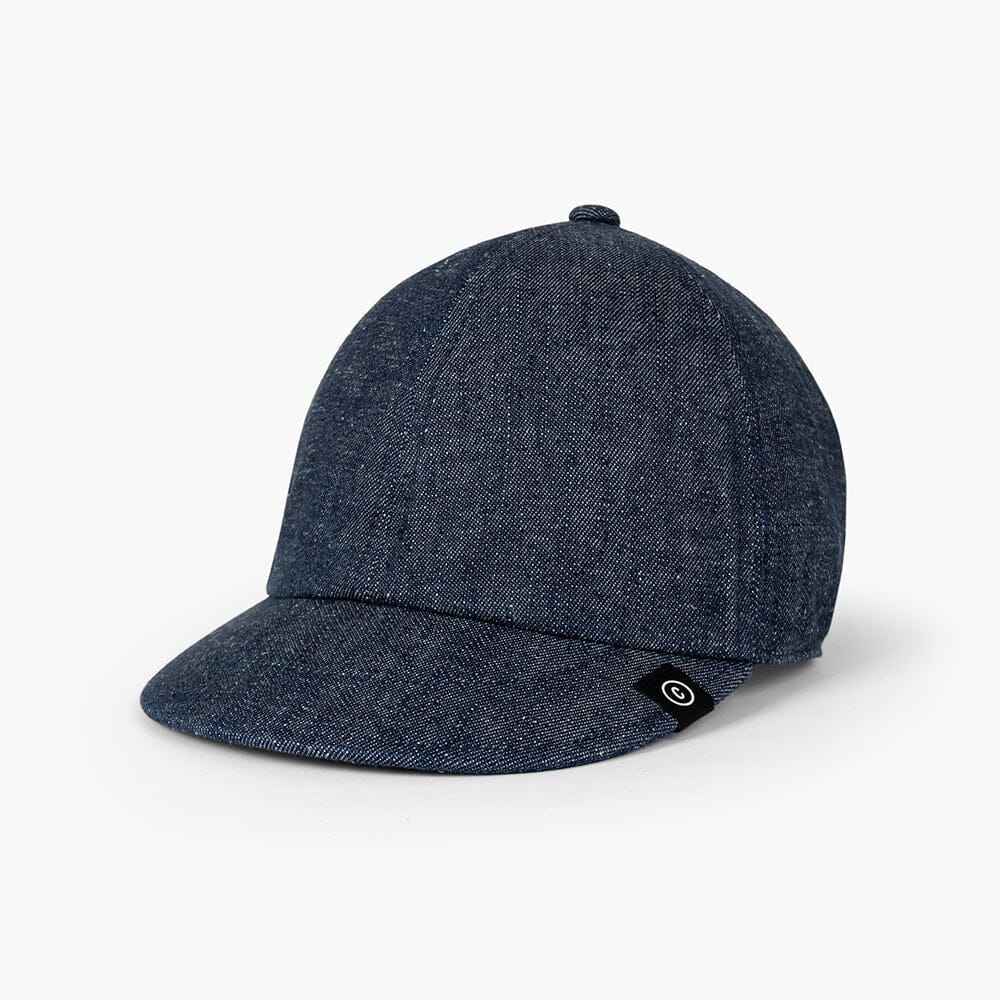 front view of ciele athletics CRWCap short brim unisex running hat with shorter brim from the Lifestyle Edition collection, in denim indigo color